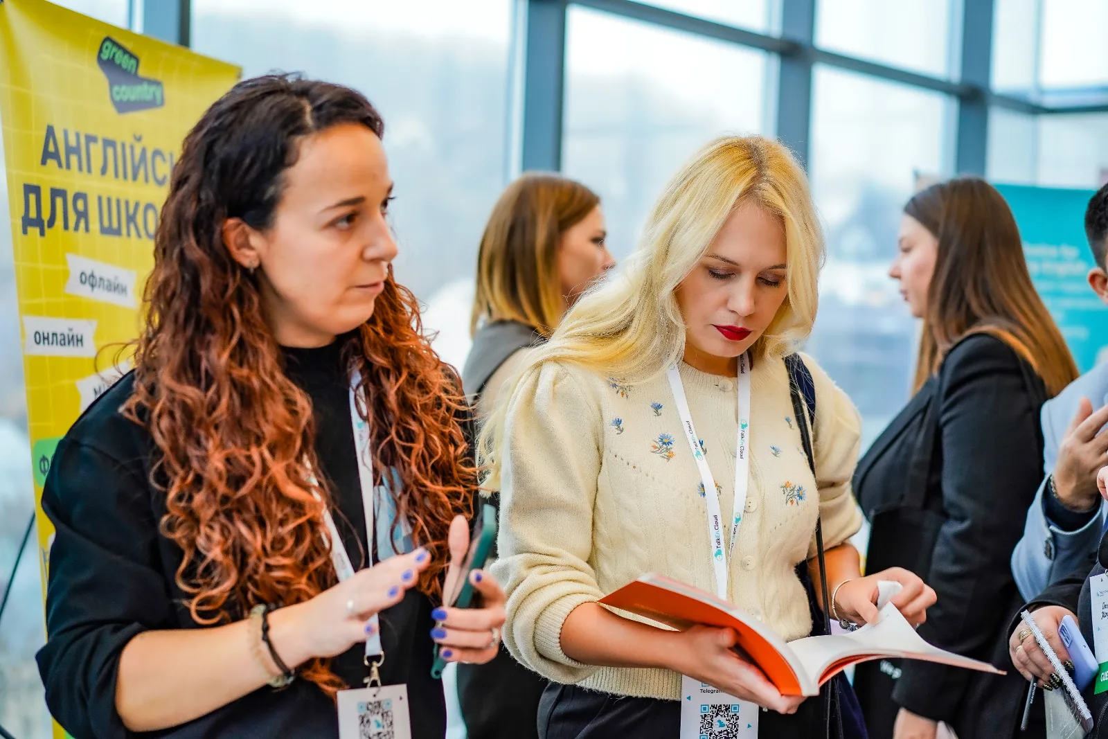 Forum participants exploring partner stands in the exhibition area